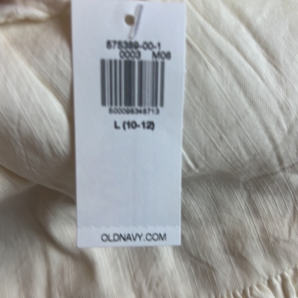 SOLD.       
NWT Cream Tiered Eyelet Ruffled Mini Dress,  Size L- 10-12 Girls - Picture 6 of 10